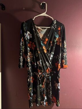 Kaileigh Black Floral Wrap Romper with Orange and Blue Flowers